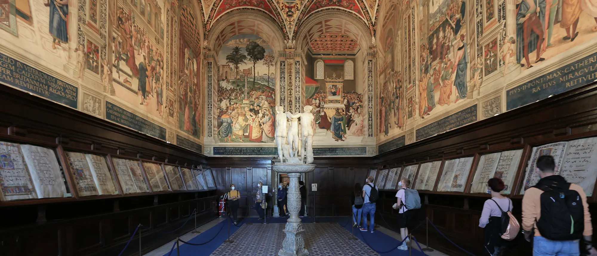The Piccolomini Library: Pinturicchio's frescoes of the life of Pope Pius II around the marble Three Graces